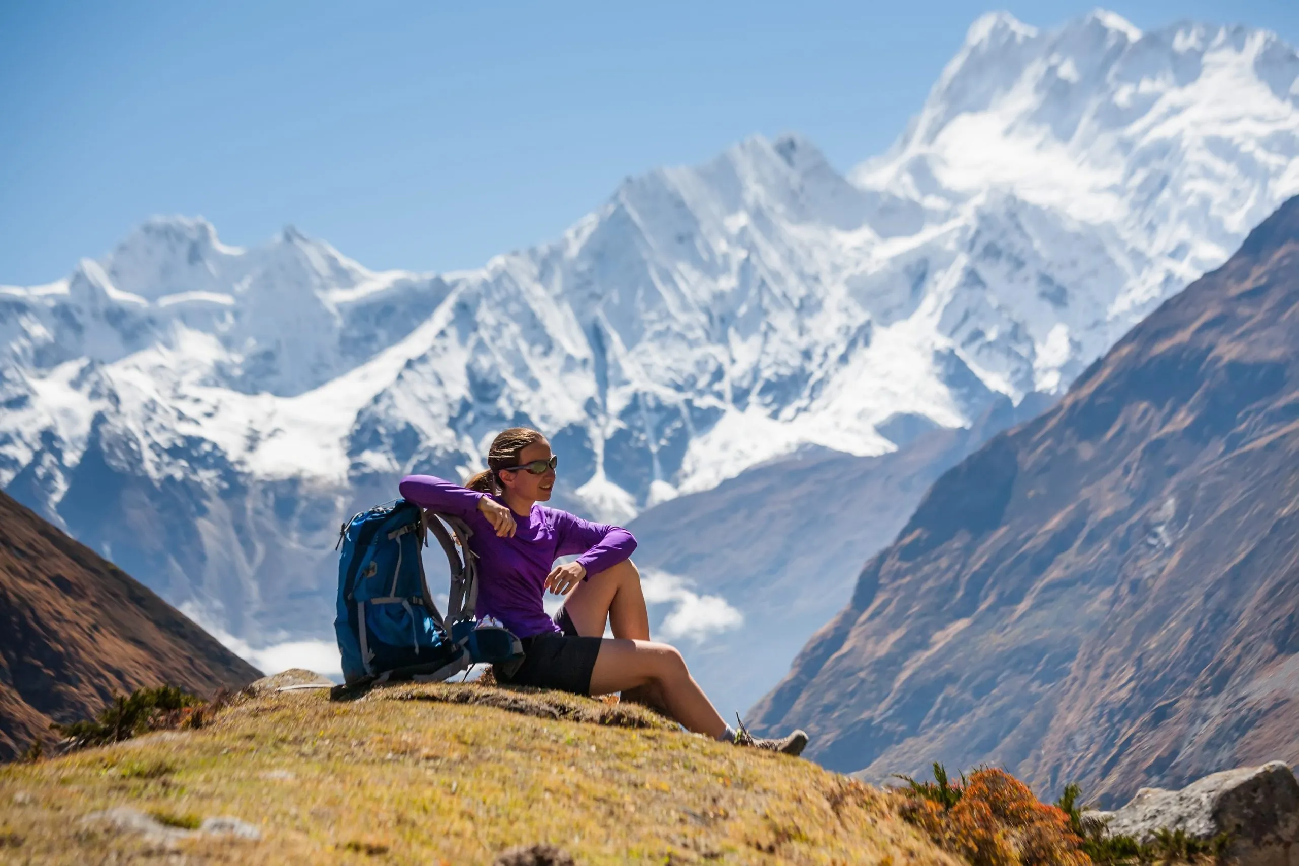 Trekker rests on Manaslu circuit trek in Nepal