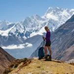 Trekker rests on Manaslu circuit trek in Nepal